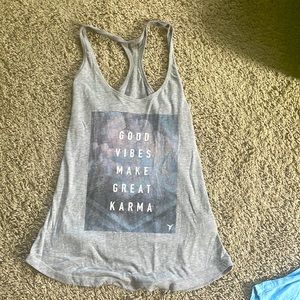 Old Navy work out tank. Slogan says “Good vibes make great karma”